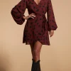 Ginger Mini Wrap Dress In Abstract Dot Black On Rust