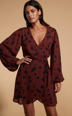 Ginger Mini Wrap Dress In Abstract Dot Black On Rust