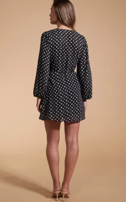 Ginger Mini Wrap Dress In Black Polka Dot