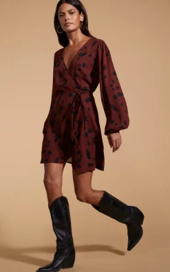 Ginger Mini Wrap Dress In Abstract Dot Black On Rust