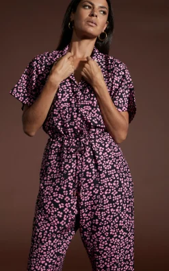 Zeta Jumpsuit In Pink On Black Leopard